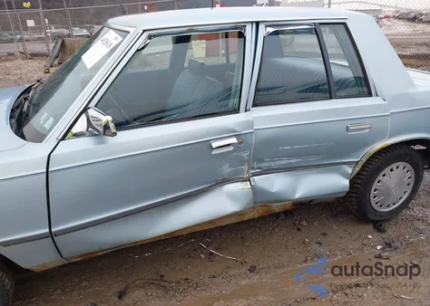 1985 Plymouth Reliant z USA, uszkodzony, nr VIN 1P3BP26C2FF159366